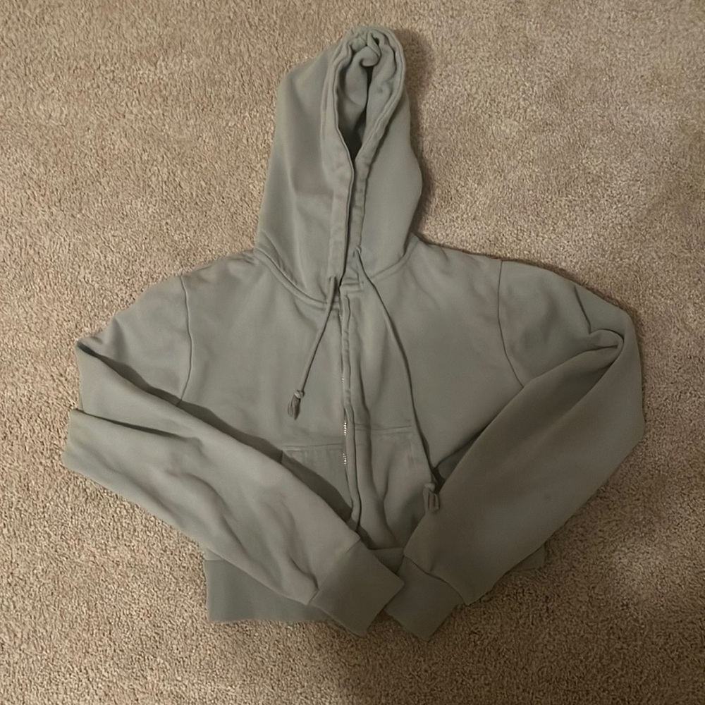 Brandy Melville sage green cropped zip up in great condition!